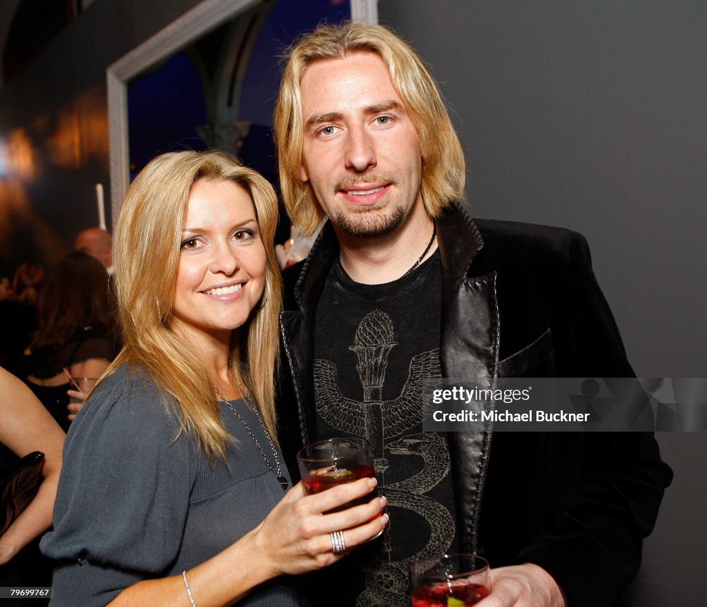 Singer Chad Kroeger and wife Marianne Gurick attend the Warner Music