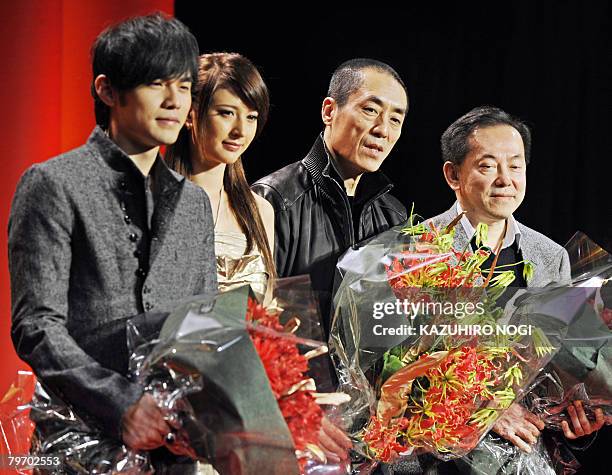 Film director Zhang Yimou , an internationally acclaimed Chinese filmmaker, poses with producer Bill Kong , actor Jay Chou , and Leah Dizon , a...