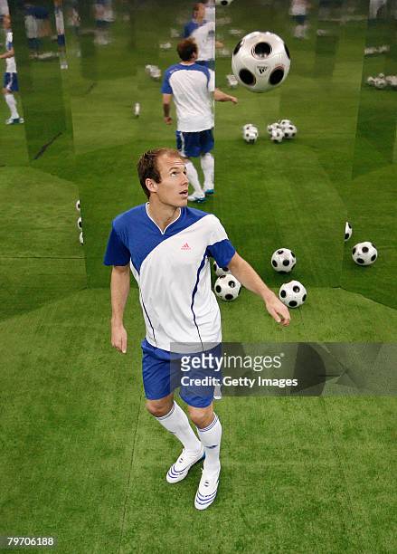 Real Madrid player Arjen Robben juggles the ball while posing for a portait during the adidas F50 TUNiT football boot launch on February 11, 2008 in...