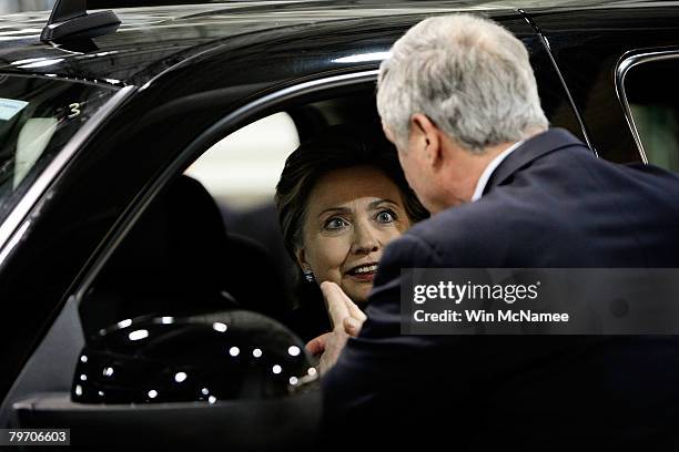 Democratic presidential candidate Sen. Hillary Clinton sits in the driver's seat of a hybrid GM Yukon during a tour of the General Motors Allison...