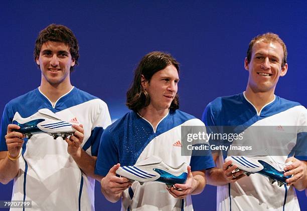 Arjen Robben of Real Madrid, Lionel Messi from Barcelona and Gonzalo Higuain also of Real Madrid pose during the adidas F50 TUNiT football boot...