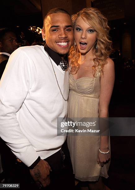 Singer Chris Brown and Singer Taylor Swift backstage at the 2008 Clive Davis Pre-GRAMMY party at the Beverly Hilton Hotel on February 9, 2008 in Los...