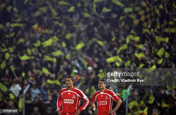 Aleksandar Mitreski and Youssef Mohamad of Koeln look dejected after receiving the 2:1 goal from Emmanuel Krontiris of Aachen during the Second...