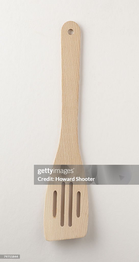 Wooden slotted spatula, studio shot