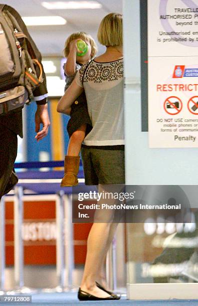 Actress Michelle Williams is seen leaving Sydney at Kingsford Smith Airport on February 10, 2008 in Sydney, Australia. Ms Williams is pictured with...