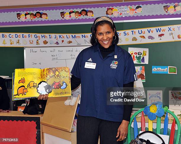 Former Harlem Globetrotter Lynette Woodard reads to children from Martin Luther King, Jr. Charter School at the NBA Cares Read to Achieve event...
