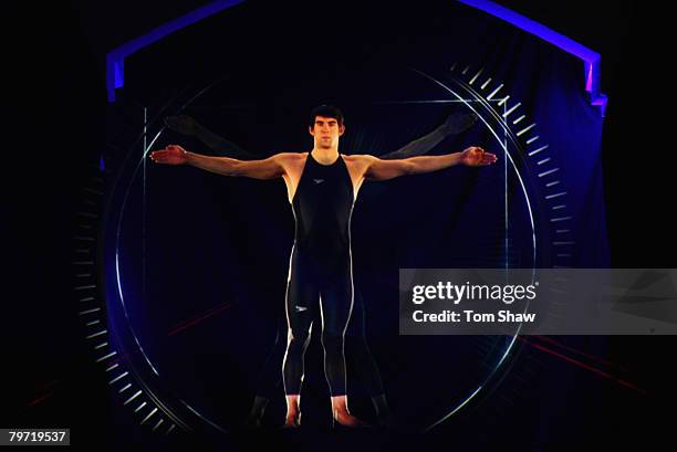 Swimmer Michael Phelps of the United States of America appears as a hologram modelling the new Speedo LZR Racer suit at its launch at The Gymnasium...