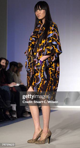 Model walks down the catwalk during the Duro Olowu LFW Autumn/Winter 2008 show on February 12, 2008 in London, England.