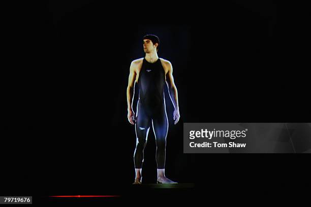 Swimmer Michael Phelps of the United States of America appears as a hologram modelling the new Speedo LZR Racer suit at its launch at The Gymnasium...