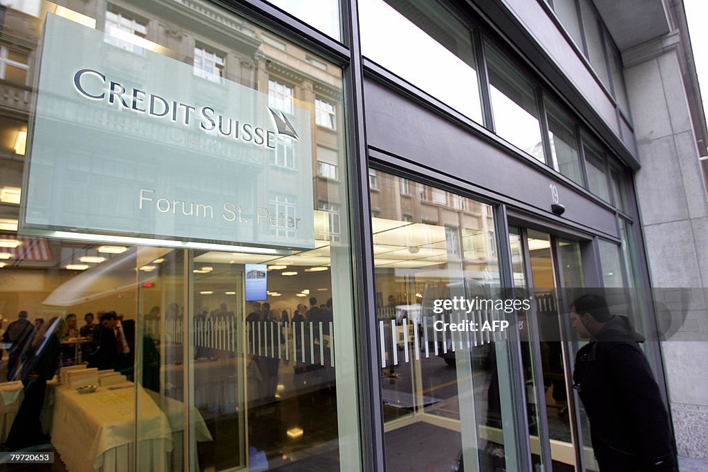 A man enters the Credit Suisse Forum St