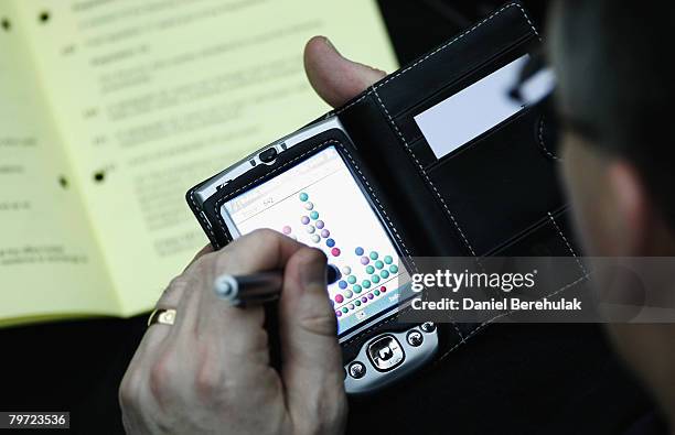 Member of Synod plays a game of Tetris during the General Synod February Sessions on February 12, 2008 in London, England. The Archbishop of...