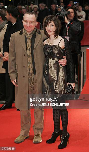 British actress Sally Hawkins and British actor Eddie Marsan pose for photographers on the red carpet at the Premiere of the film 'Happy-Go-Lucky'...