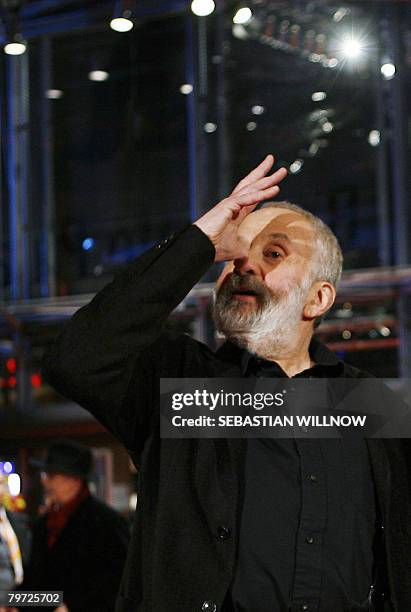 British director Mike Leigh poses for photographers on the red carpet at the Premiere of the film 'Happy-Go-Lucky' presented in competition for the...