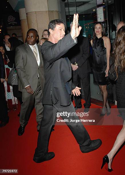 Sylvester Stallone waves to the fans as he arrives at the London Gala Premiere of "Rambo" at the Vue West End on February 12, 2008 in London, England.