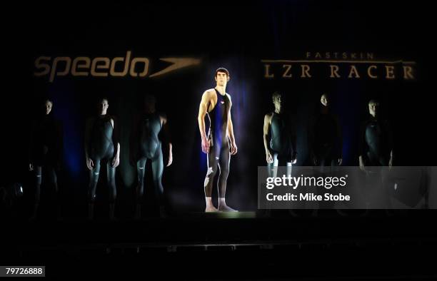 Ryan Lochte, Katie Hoff,Amanda Beard, Natalie Coughlin, Kate Ziegler, and Dara Torres model the new LZR RACER along side a hologram of Michael Phelps...