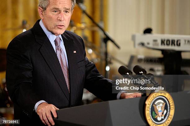 President George W. Bush addresses an African American History Month celebration in the East Room of the White House February 12, 2008 in Washington,...