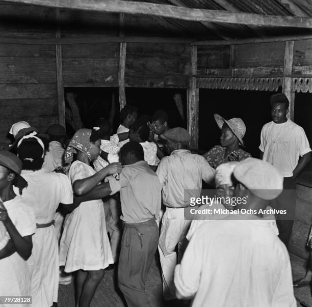 Maroons attend a dance in the mountain region known as Cockpit Country in 1946 in Accompong, Jamaica.