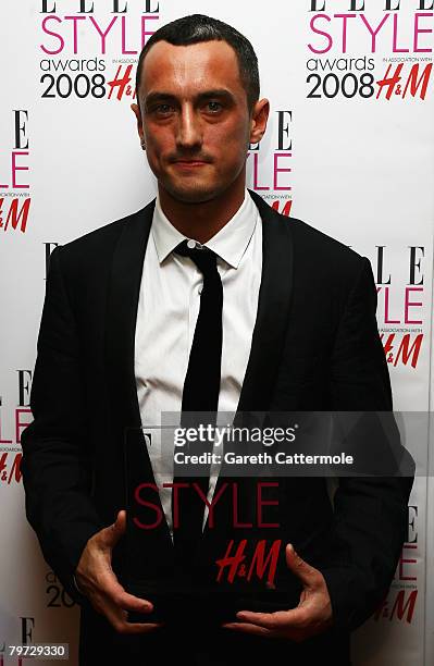 Richard Nicoll poses in the press room with his award for Young Designer at the Elle Style Awards 2008 at The Westway on February 12, 2008 in London,...