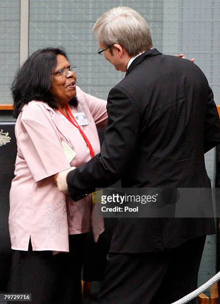 Australian Prime Minister Kevin Rudd greets a member of Australia's Stolen Generation in the public gallery after delivering a speech where he...