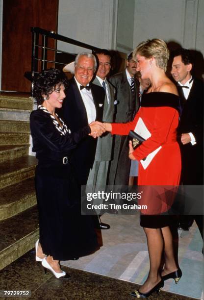 Diana, Princess of Wales meets Joan Collins at a charity performance of 'Private Lives' at the Aldwych Theatre in aid of the Royal Marsden Hospital's...