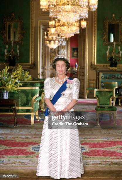Queen Elizabeth II in the Green Room at home in Windsor Castle