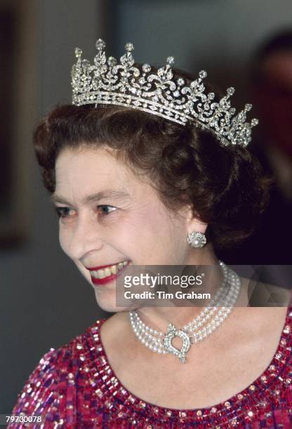 Queen Elizabeth II wears a four strand diamond and pearl choker with 'Granny's Tiara' to an engagement in Bangladesh