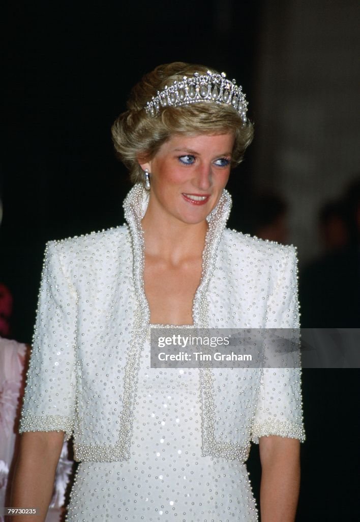 Princess Diana in Hong Kong, wears an outfit described as th