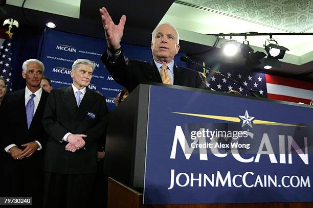 Presidential hopeful Sen. John McCain speaks to supporters as U.S. Sen. John Warner and Florida Gov. Charlie Crist look on during a primary night...