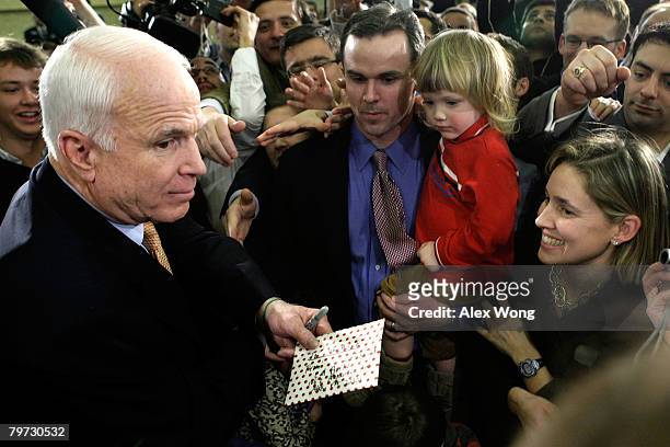 Presidential hopeful Sen. John McCain greets supporters during a primary night party February 12, 2008 in Alexandria, Virginia. McCain won primaries...
