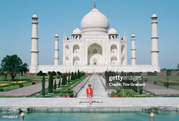 Diana Princess of Wales sits in front of the Taj Mahal during a visit to India