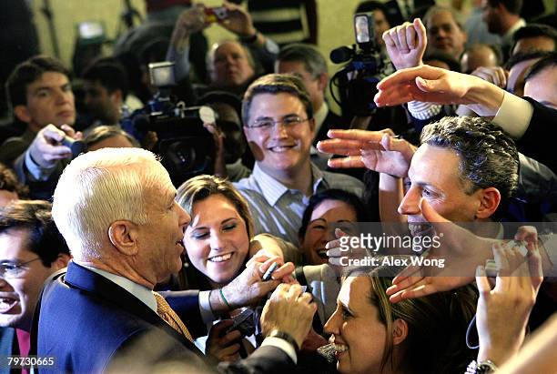 Presidential hopeful Sen. John McCain greets supporters during a primary night party February 12, 2008 in Alexandria, Virginia. McCain won primaries...