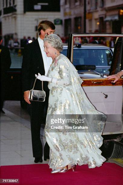 Queen Elizabeth II arrives for The Amir of Kuwait banquet at Claridge's Hotel in London