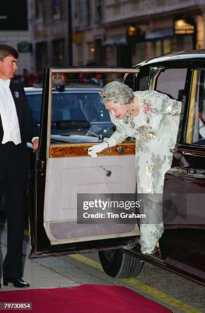 Queen Elizabeth II arrives for The Amir of Kuwait banquet at Claridge's Hotel in London