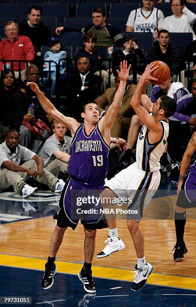 Beno Udrih of the Sacramento Kings tries to block a shot by Juan Carlos Navarro of the Memphis Grizzlies on February 12, 2008 at the FedExForum in...