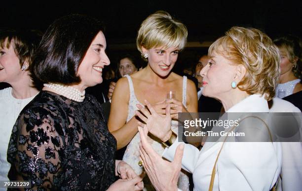 Diana, Princess of Wales, with her friend Lucia Flecha De Lima and Barbara Walters at the pre-auction party at Christie's in New York