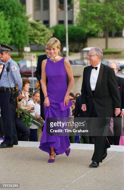 Diana, Princess of Wales arriving for a gala dinner in Chicago, Her dress is by designer Versace and her shoes by Jimmy Choo