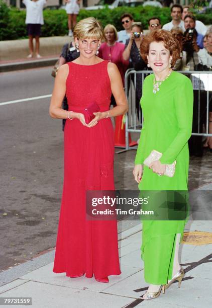 Diana, Princess of Wales with Elizabeth Dole attends a fund raising gala dinner for the American Red Cross in Washington, Diana is wearing a dress...