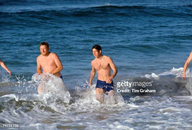 Prince Charles, Prince of Wales with his bodyguard in the sea at Bondi Beach, as he takes some time off to relax during his official tour of Australia