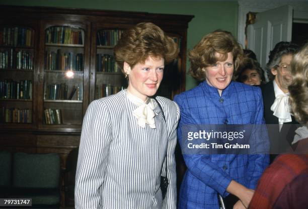 Lady Jane Fellows and Lady Sarah McCorquodale, Princess Diana's sisters, meeting the headmistress of West Heath School that they used to attend