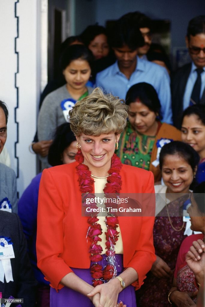 Diana, Princess of Wales wears a garland during her visit to the ...