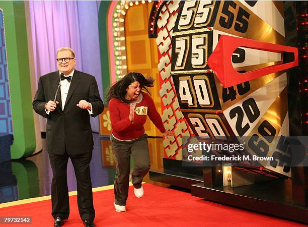 Host Drew Carey and a contestant celebrate during "The Price is Right" Million Dollar spectacular taping at CBS Television City on February 12, 2008...