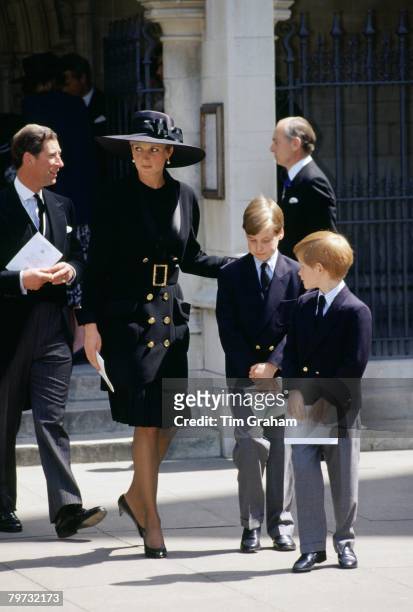 Prince Charles, Prince of Wales accompanies Diana, Princess of Wales and their sons, Prince William and Prince Harry at a memorial service held for...