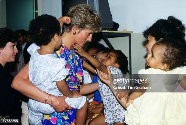 Diana, Princess of Wales visits a hostel for abandoned children in Sao Paulo, Brazil, many of them HIV positive or suffering from AIDS