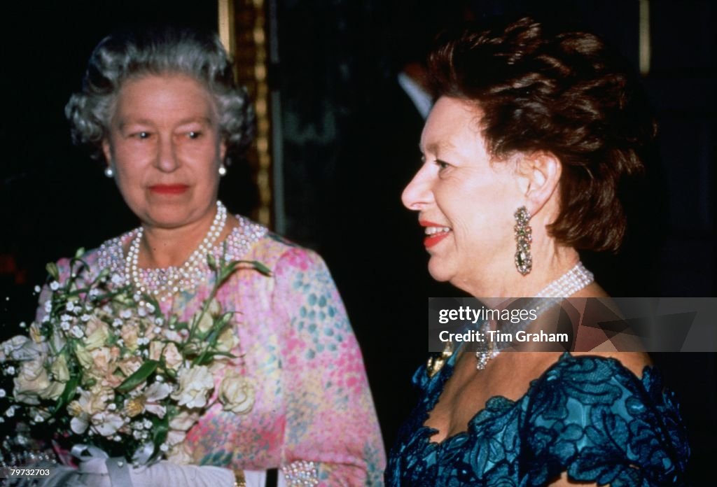 Queen Elizabeth II and Princess Margaret attend a charity co