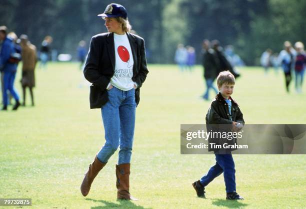 Prince William with his mother Diana, Princess of Wales at Guards Polo Club, The Princess is casually dressed in a sweatshirt with the British Lung...