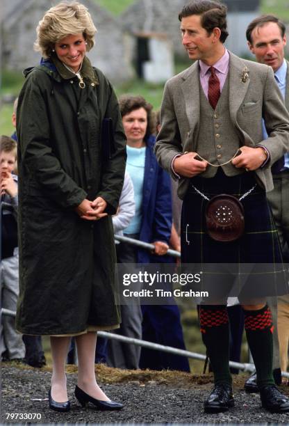 Prince Charles, Prince of Wales and Diana, Princess of Wales visit Castlebay in Barra, the Western Isles, The Princess is wearing a Barbour style...