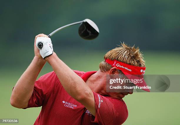 Darren Clarke of Northern Ireland plays a tee shot during practice before the 2007 Enjoy Jakarta Astro Indonesian Open at the Cengkareng Golf Club on...