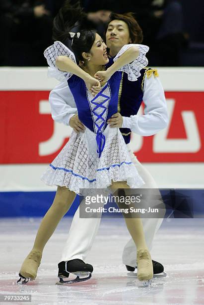 Xiaoyang Yu and Chen Wang of China perform during a Ice Dancing Compulsory Dance skating session for the the International Skating Union Four...