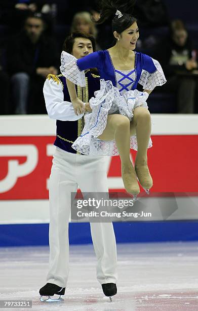 Xiaoyang Yu and Chen Wang of China perform during a Ice Dancing Compulsory Dance skating session for the the International Skating Union Four...