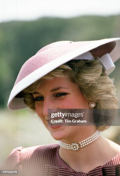 Diana, Princess of Wales wears a hat designed by milliner Frederick Fox during a visit to Italy